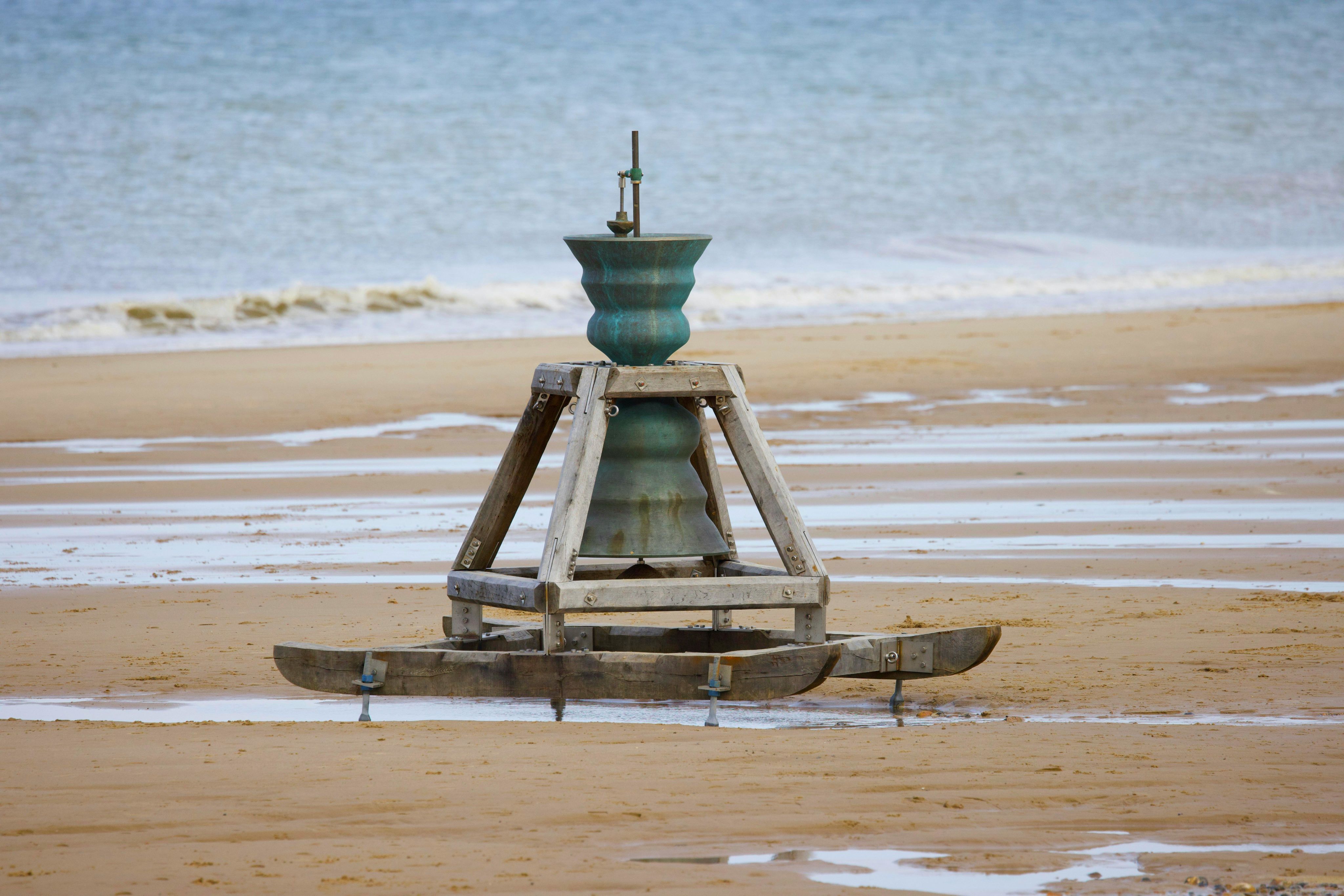 View of a Time and Tide Bell on the Beach in Happisburgh, Norfolk, England, photo by Stephen Noulton